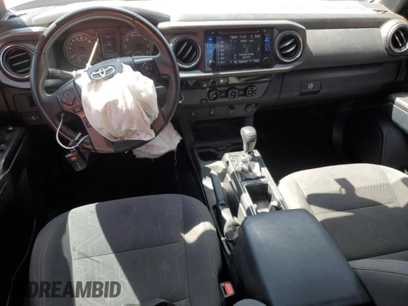 2017 Toyota Tacoma SR5 with VIN 5TFAZ5CN5HX051995, listed as a Copart auction lot 52018825 with 96,963 mi miles and Salvage Title. Bid and sale history available at DreamBid. Image 8.
