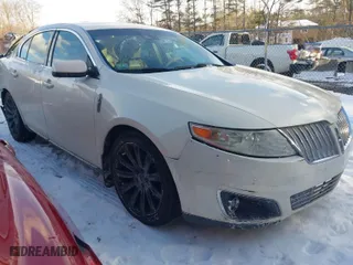 2009 Lincoln MKS with VIN 1LNHM94RX9G635375, listed as a IAAI auction lot 41393508 with 145,424 mi miles. Bid and sale history available at carsss.com. Image 1.
