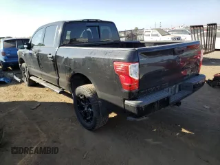 2018 Nissan Titan XD PRO-4X with VIN 1N6BA1F40JN542870, listed as a Copart auction lot 75204174 with 115,603 mi miles and Salvage Title. Bid and sale history available at carsss.com. Image 2.