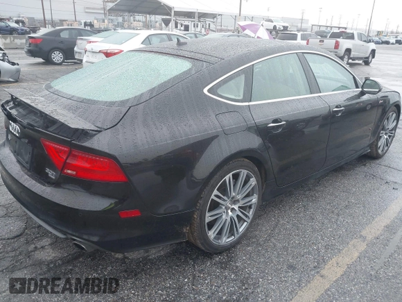 2014 Audi A7 3.0 Prestige with VIN WAU2GAFC5EN090233, listed as a IAAI auction lot 41565942 with 199,890 mi miles. Bid and sale history available at carsss.com. Image 4.