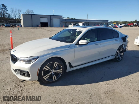 2019 BMW 7 Series 750i with VIN WBA7F0C5XKGM25897, listed as a Copart auction lot 86758004 with 68,700 mi miles and Salvage title. Bid and sale history available at DreamBid. Image 1.