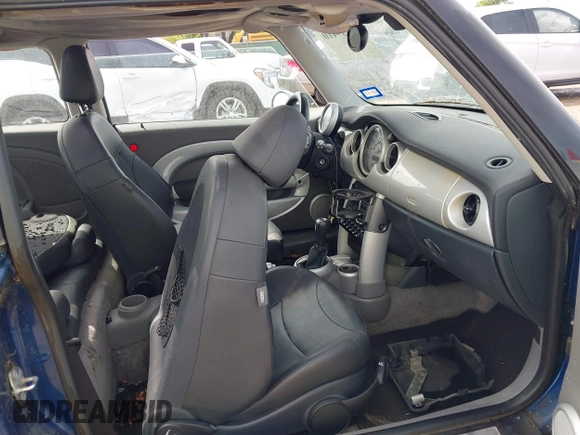 2004 MINI Hardtop with VIN WMWRC33474TJ60134, listed as a IAAI auction lot 42389410 with 183,452 mi miles and . Bid and sale history available at DreamBid. Image 5.