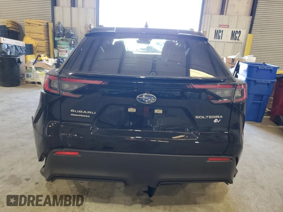 2024 Subaru Solterra Premium с VIN JTMABABA5RA069297, выставлен на аукционе Copart как лот 82713354 с пробегом 3 606 миль миль и Списание • Salvage title. История ставок и продаж доступна на DreamBid. Изображение 6.