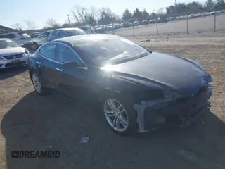 2013 Tesla Model S with VIN 5YJSA1CN7DFP28067, listed as a IAAI auction lot 41817147 with 75,586 mi miles. Bid and sale history available at carsss.com. Image 1.