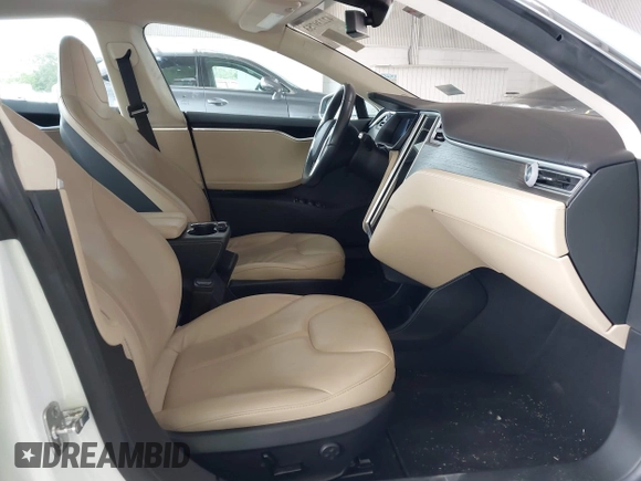 2014 Tesla Model S 60 with VIN 5YJSA1S16EFP53350, listed as a IAAI auction lot 42239753 with 104,985 mi miles and . Bid and sale history available at DreamBid. Image 5.