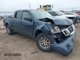2014 Nissan Frontier SV z VIN 1N6AD0FR4EN712033, wystawiony jako IAAI lot #41284348 z przebiegiem 91 882 mil mil oraz . Historia ofert i sprzedaży dostępna na DreamBid. Obrazek 1.