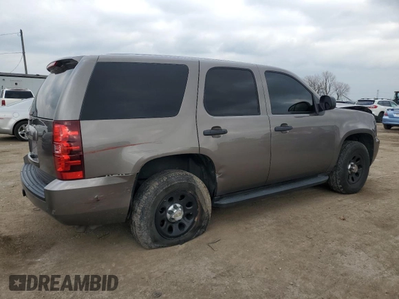 2012 Chevrolet Tahoe Commercial with VIN 1GNSK2E07CR324903, listed as a Copart auction lot 80266624 with 131,700 mi miles and Salvage title. Bid and sale history available at DreamBid. Image 3.