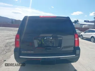 2015 Chevrolet Suburban LTZ with VIN 1GNSKKKC9FR280390, listed as a IAAI auction lot 41882449 with 80,499 mi miles and . Bid and sale history available at DreamBid. Image 16.