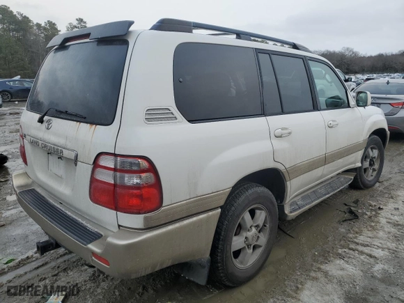 2004 Toyota Land Cruiser with VIN JTEHT05JX42067402, listed as a Copart auction lot 88976025 with 350,518 mi miles and Salvage Title. Bid and sale history available at carsss.com. Image 3.