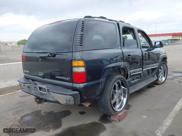 2004 Chevrolet Tahoe LT with VIN 1GNEK13T54J146851, listed as a IAAI auction lot 41990571 with 172,025 mi miles. Bid and sale history available at carsss.com. Image 4.