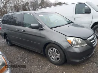 2007 Honda Odyssey EX-L z VIN 5FNRL38757B461742, wystawiony jako IAAI lot #41266722 z przebiegiem Nie podano mil oraz . Historia ofert i sprzedaży dostępna na DreamBid. Obrazek 1.