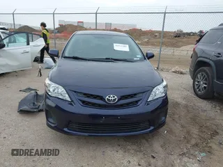 2012 Toyota Corolla L with VIN 5YFBU4EE7CP061770, listed as a IAAI auction lot 41922205 with 154,615 mi miles. Bid and sale history available at carsss.com. Image 12.