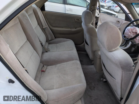 1999 Mazda 626 ES z VIN 1YVGF22C9X5887587, wystawiony jako Copart lot #46346305 z przebiegiem 92 715 mil mil oraz Szkoda całkowita • Salvage title. Historia ofert i sprzedaży dostępna na DreamBid. Obrazek 10.