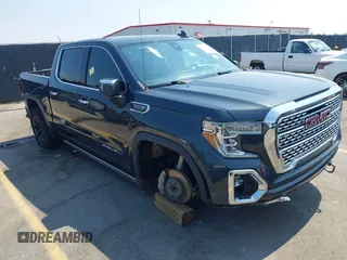 2021 GMC Sierra 1500 Denali with VIN 1GTU9FEL2MZ444138, listed as a IAAI auction lot 42416433 with 73,301 mi miles and . Bid and sale history available at DreamBid. Image 1.