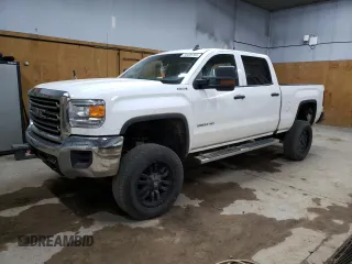 2018 GMC Sierra 2500HD z VIN 1GT12REG9JF164936, wystawiony jako Copart lot #70438794 z przebiegiem 206 573 mil mil oraz Szkoda całkowita • Salvage title. Historia ofert i sprzedaży dostępna na DreamBid. Obrazek 1.