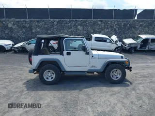 2004 Jeep Wrangler Sport with VIN 1J4FA49S04P781581, listed as a IAAI auction lot 42078693 with 111,123 mi miles and . Bid and sale history available at DreamBid. Image 13.