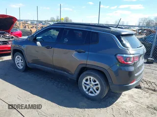 2019 Jeep Compass Sport with VIN 3C4NJCAB0KT613116, listed as a IAAI auction lot 39002435 with 59,805 mi miles and . Bid and sale history available at DreamBid. Image 3.