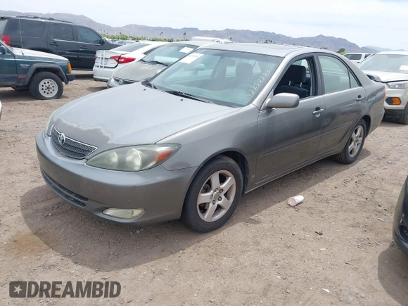 2003 Toyota Camry LE with VIN JTDBE32K530236769, listed as a IAAI auction lot 42250783 with 194,445 mi miles and . Bid and sale history available at DreamBid. Image 2.
