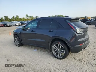 2022 Cadillac XT4 FWD Sport z VIN 1GYFZER45NF156035, wystawiony jako Copart lot #65836294 z przebiegiem 62 443 mil mil oraz Szkoda całkowita • Salvage title. Historia ofert i sprzedaży dostępna na DreamBid. Obrazek 2.