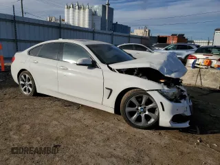 2015 BMW 4 Series 428i with VIN WBA4A9C55FGL86731, listed as a Copart auction lot 42700155 with 110,897 mi miles and Salvage title. Bid and sale history available at DreamBid. Image 4.