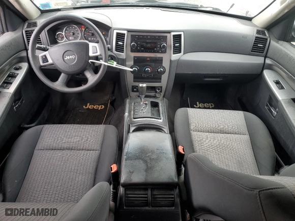 2009 Jeep Grand Cherokee Laredo with VIN 1J8GS48K49C535701, listed as a Copart auction lot 44306675 with 306,585 mi miles and Salvage Title. Bid and sale history available at carsss.com. Image 8.