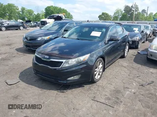 2013 Kia Optima EX z VIN 5XXGN4A71DG184078, wystawiony jako IAAI lot #42124359 z przebiegiem 196 389 mil mil oraz . Historia ofert i sprzedaży dostępna na DreamBid. Obrazek 2.