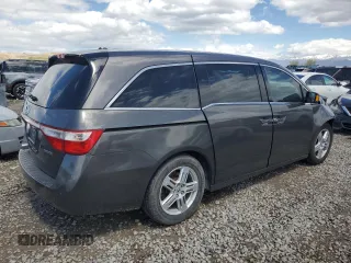 2012 Honda Odyssey Touring with VIN 5FNRL5H97CB070213, listed as a Copart auction lot 53558715 with 218,964 mi miles and Salvage title. Bid and sale history available at DreamBid. Image 3.