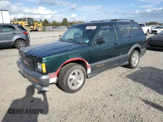 1993 GMC Jimmy z VIN 1GDCT18Z9P0810178, wystawiony jako Copart lot #79442614 z przebiegiem 19 514 mil mil oraz Szkoda całkowita • Salvage title. Historia ofert i sprzedaży dostępna na DreamBid. Obrazek 1.