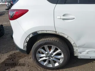 2014 Mazda CX-5 Grand Touring with VIN JM3KE4DY7E0425201, listed as a IAAI auction lot 41803597 with 118,867 mi miles. Bid and sale history available at carsss.com. Image 12.