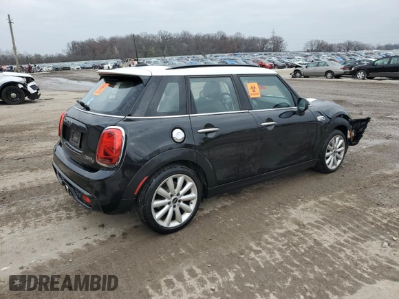 2021 MINI Hardtop 4 Door Cooper S с VIN WMWXU9C04M2M96933, выставлен на аукционе Copart как лот 80886524 с пробегом 60 746 миль миль и Списание • Salvage title. История ставок и продаж доступна на DreamBid. Изображение 3.