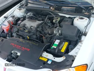1999 Pontiac Grand Am GT z VIN 1G2NW12E3XM830305, wystawiony jako IAAI lot #41797278 z przebiegiem 87 537 mil mil oraz . Historia ofert i sprzedaży dostępna na DreamBid. Obrazek 13.