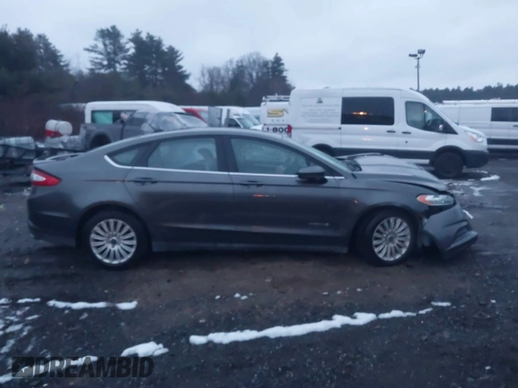 2015 Ford Fusion S Hybrid with VIN 3FA6P0UU2FR102241, listed as a IAAI auction lot 41003479 with 88,020 mi miles. Bid and sale history available at carsss.com. Image 12.