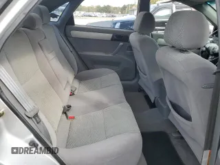 2006 Suzuki Forenza z VIN KL5JD56Z96K362651, wystawiony jako Copart lot #78306894 z przebiegiem 167 916 mil mil oraz Tytuł czysty. Historia ofert i sprzedaży dostępna na DreamBid. Obrazek 10.