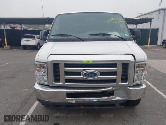 2012 Ford Econoline Cargo Recreational with VIN 1FTNE2EW8CDA64042, listed as a IAAI auction lot 42197470 with 130,647 mi miles. Bid and sale history available at carsss.com. Image 12.