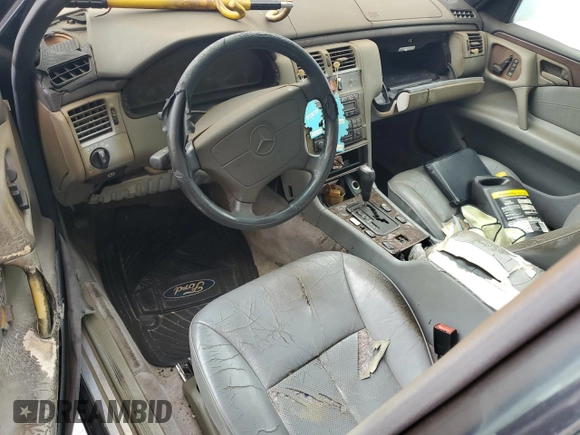 1997 Mercedes-Benz E-Class with VIN WDBJF55F4VJ025769, listed as a Copart auction lot 73460164 with 0 mi miles and Salvage Title. Bid and sale history available at carsss.com. Image 8.