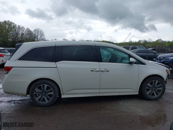 2015 Honda Odyssey Touring Elite with VIN 5FNRL5H98FB076428, listed as a IAAI auction lot 41998339 with 114,573 mi miles. Bid and sale history available at carsss.com. Image 13.