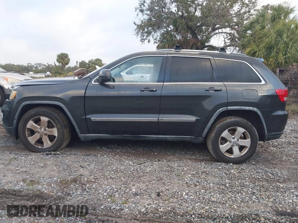 2011 Jeep Grand Cherokee Laredo z VIN 1J4RR4GG2BC737140, wystawiony jako IAAI lot #41217587 z przebiegiem Nie podano mil oraz . Historia ofert i sprzedaży dostępna na DreamBid. Obrazek 14.