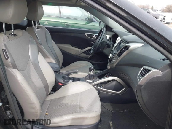 2013 Hyundai Veloster w/Black Int with VIN KMHTC6AD8DU155575, listed as a IAAI auction lot 41722849 with 100,204 mi miles and . Bid and sale history available at DreamBid. Image 5.