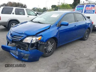2013 Toyota Corolla L with VIN 5YFBU4EE8DP166741, listed as a IAAI auction lot 41896115 with 154,011 mi miles. Bid and sale history available at carsss.com. Image 2.