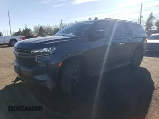 2021 Chevrolet Suburban RST z VIN 1GNSKEKD8MR193782, wystawiony jako Copart lot #82821484 z przebiegiem 74 195 mil mil oraz Szkoda całkowita • Salvage title. Historia ofert i sprzedaży dostępna na DreamBid. Obrazek 1.