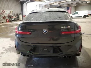 2022 BMW X4 M with VIN 5YM23EC05N9J23246, listed as a Copart auction lot 48730835 with 0 mi miles and Salvage Title. Bid and sale history available at carsss.com. Image 6.