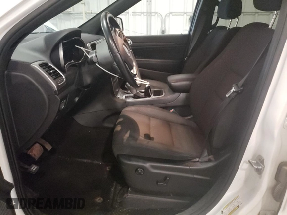2020 Jeep Grand Cherokee Laredo E with VIN 1C4RJFAG2LC268005, listed as a Copart auction lot 52321235 with 63,285 mi miles and Salvage Title. Bid and sale history available at carsss.com. Image 7.