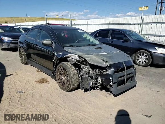 2008 Mitsubishi Lancer Evolution GSR with VIN JA3AW86V58U049914, listed as a Copart auction lot 62105824 with 129,622 mi miles and Salvage Title. Bid and sale history available at carsss.com. Image 10.