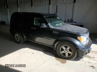 2009 Dodge Nitro SE z VIN 1D8GU28K89W545430, wystawiony jako Copart lot #50225085 z przebiegiem 143 938 mil mil oraz Szkoda całkowita • Salvage title. Historia ofert i sprzedaży dostępna na DreamBid. Obrazek 4.