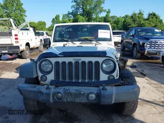 2016 Jeep Wrangler Unlimited Sport z VIN 1C4BJWDG5GL257423, wystawiony jako IAAI lot #42530026 z przebiegiem 157 072 mil mil oraz . Historia ofert i sprzedaży dostępna na DreamBid. Obrazek 12.
