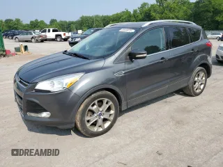 2015 Ford Escape Titanium z VIN 1FMCU0J9XFUA05573, wystawiony jako Copart lot #58836975 z przebiegiem 194 893 mil mil oraz Szkoda całkowita • Salvage title. Historia ofert i sprzedaży dostępna na DreamBid. Obrazek 1.