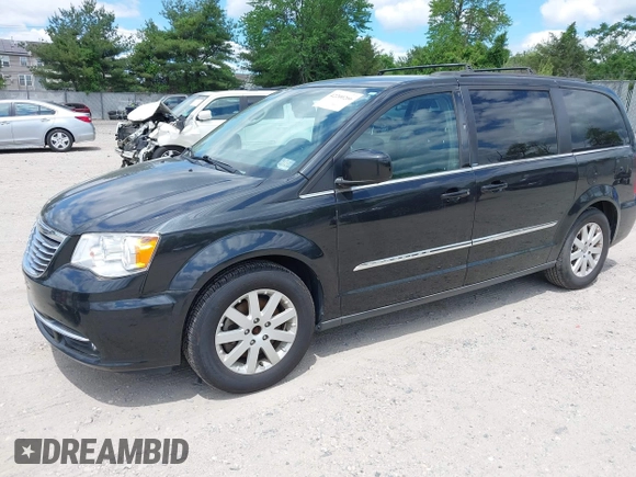 2014 Chrysler Town & Country Touring with VIN 2C4RC1BG2ER206979, listed as a IAAI auction lot 42200266 with 217,610 mi miles and . Bid and sale history available at DreamBid. Image 2.