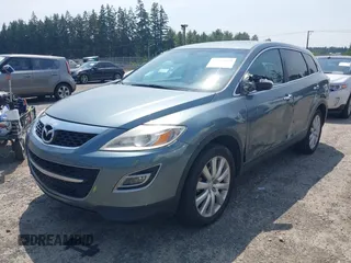 2010 Mazda CX-9 Touring z VIN JM3TB3MV5A0220905, wystawiony jako IAAI lot #42566018 z przebiegiem 158 152 mil mil oraz . Historia ofert i sprzedaży dostępna na DreamBid. Obrazek 2.