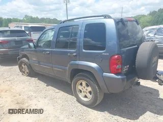 2002 Jeep Liberty Limited z VIN 1J8GL58K32W156681, wystawiony jako IAAI lot #42209101 z przebiegiem 158 743 mil mil oraz . Historia ofert i sprzedaży dostępna na DreamBid. Obrazek 3.