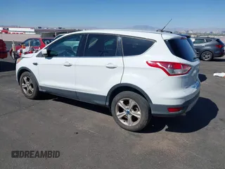 2013 Ford Escape SE with VIN 1FMCU9GX8DUA42581, listed as a IAAI auction lot 42088045 with 153,145 mi miles. Bid and sale history available at carsss.com. Image 3.